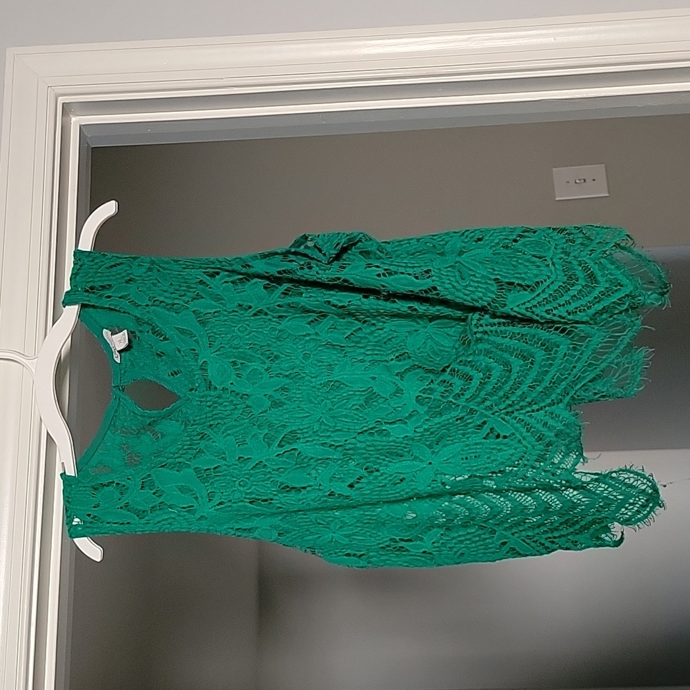 Green sleeveless shirt